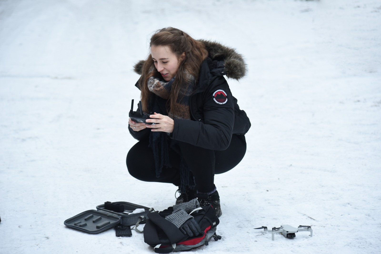 Erin with photo equipment in the snow